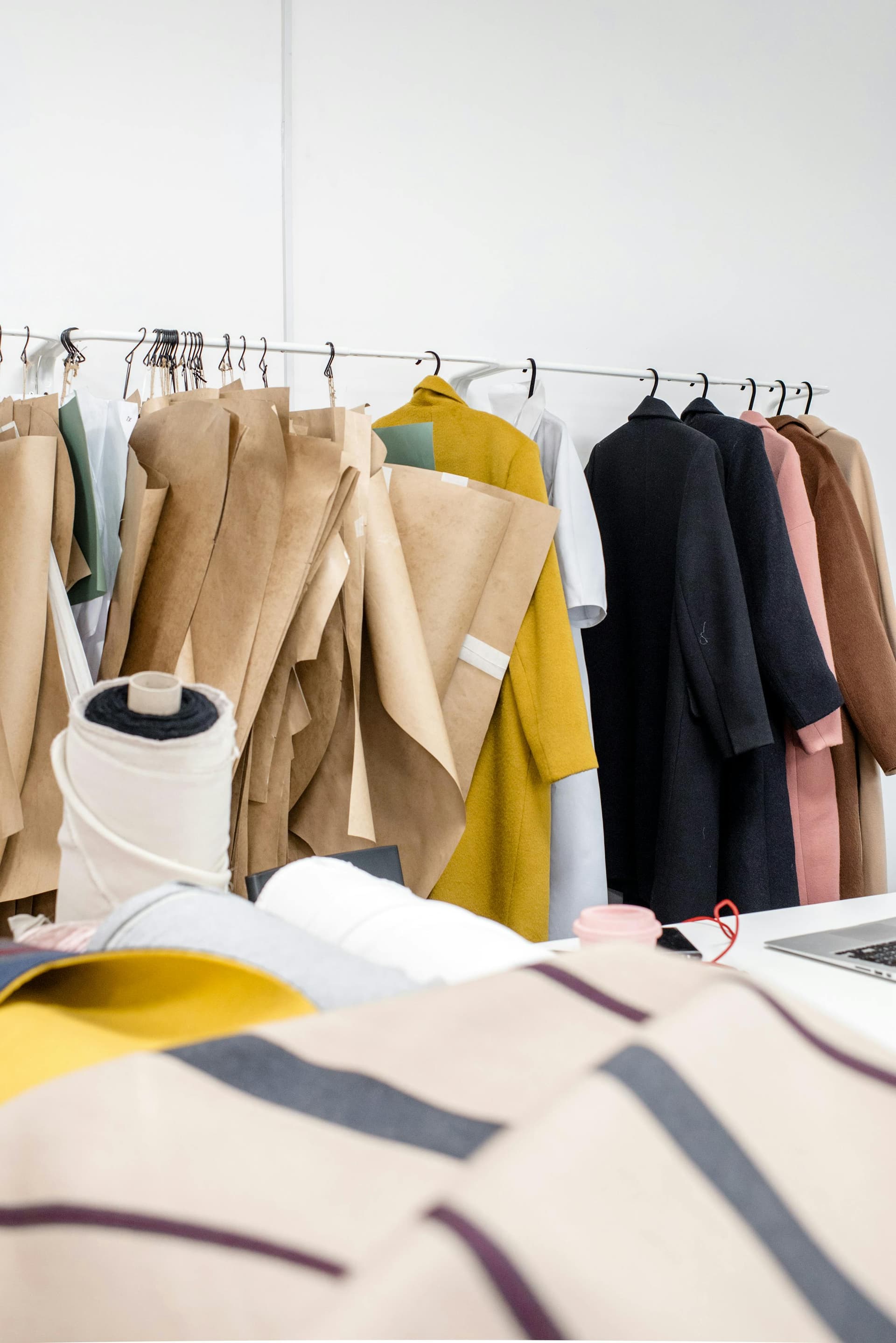 Italian fashion atelier with garments and fabrics