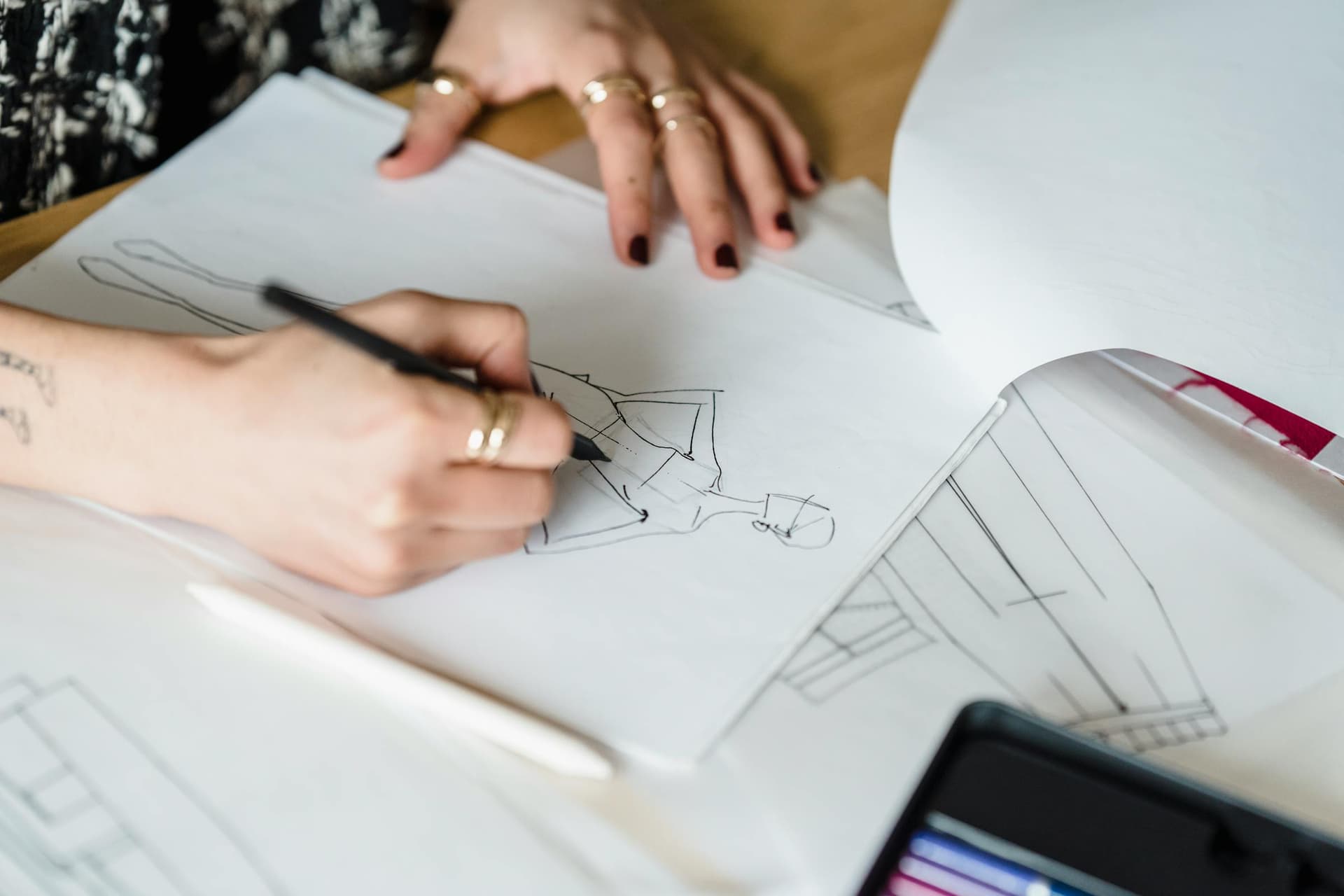 Fashion designer sketching a collection